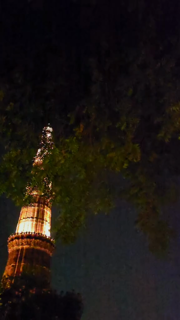 Vertical Night View of Illuminated Qutub Minar Delhi India