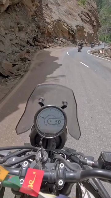 Vertical POV of Adventure Motorcycle Ride on Scenic Himalayan Road in Ladakh