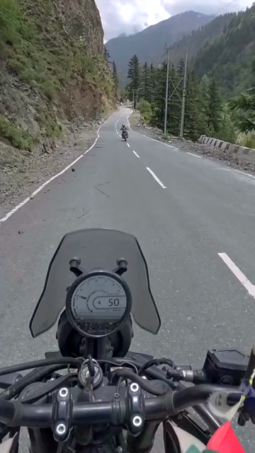 Vertical POV of Adventure Motorcycle Ride on Scenic Himalayan Road in Ladakh
