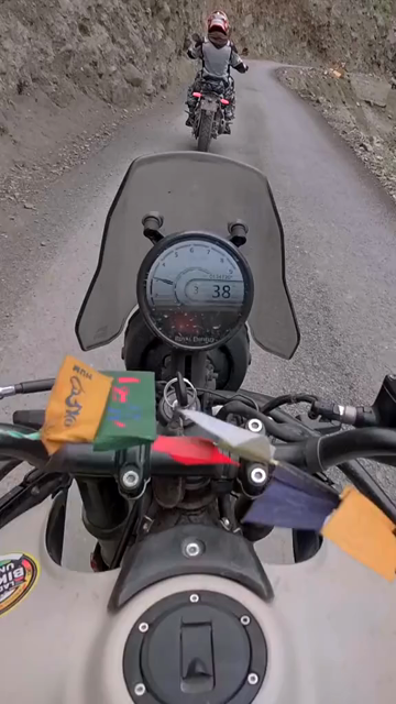 Vertical POV of Adventure Motorcycle Ride on Scenic Himalayan Road in Ladakh