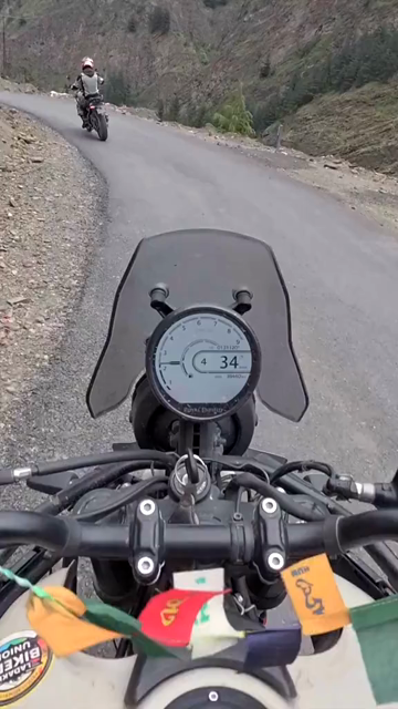 Vertical POV of Adventure Motorcycle Ride on Scenic Himalayan Road in Ladakh