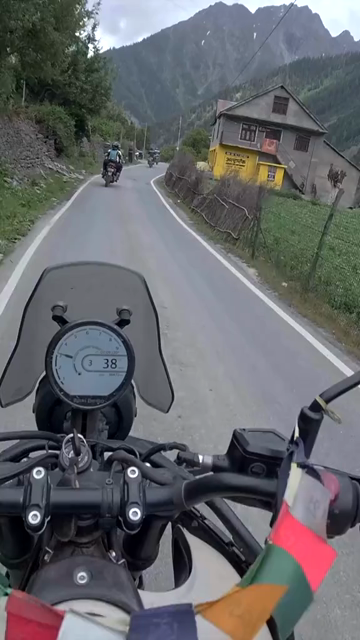 Vertical POV of Adventure Motorcycle Ride on Scenic Himalayan Road in Ladakh