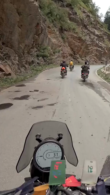 Vertical POV of Adventure Motorcycle Ride on Scenic Himalayan Road in Ladakh