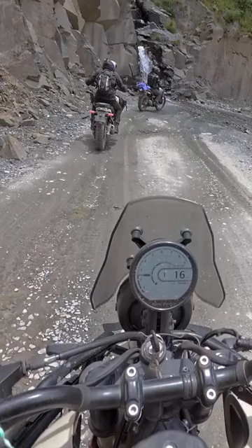 Vertical POV of Adventure Motorcycle Ride on Scenic Himalayan Road in Ladakh