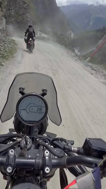Vertical POV of Adventure Motorcycle Ride on Scenic Himalayan Road in Ladakh