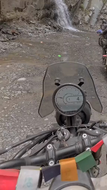 Vertical POV of Adventure Motorcycle Ride on Scenic Himalayan Road in Ladakh