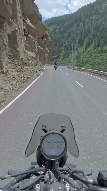 Vertical POV of Adventure Motorcycle Ride on Scenic Himalayan Road in Ladakh