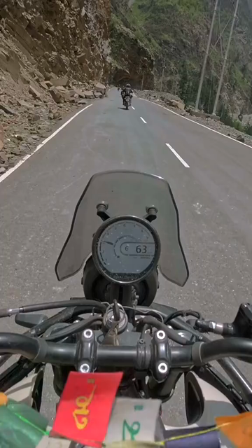 Vertical POV of Adventure Motorcycle Ride on Scenic Himalayan Road in Ladakh