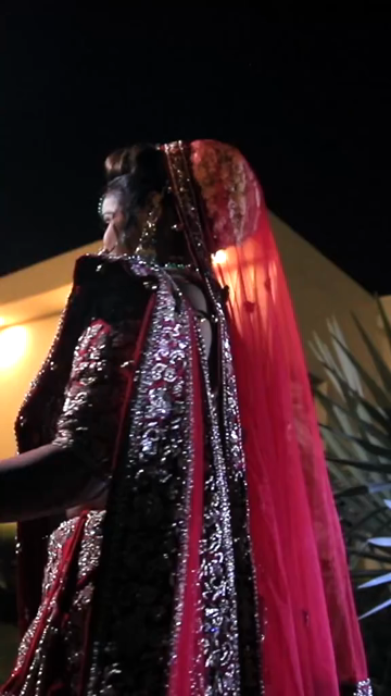 Vertical Portrait of Beautiful Indian Bride in Traditional Bridal Attire