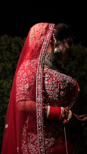 Vertical Portrait of Beautiful Indian Bride in Traditional Bridal Attire