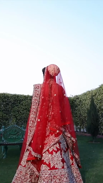 Vertical Portrait of Beautiful Indian Bride in Traditional Bridal Attire