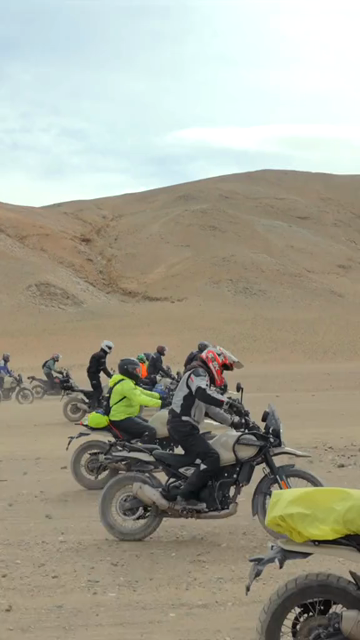 Vertical Shot of Adventure Motorcyclists Off-Roading in Ladakh, India