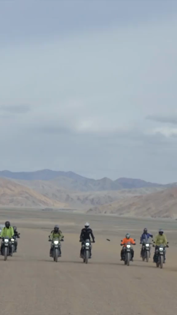 Vertical Shot of Adventure Motorcyclists Off-Roading in Ladakh, India