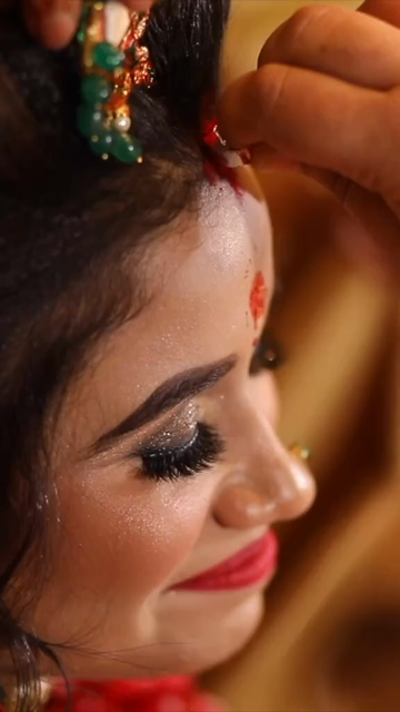 Vertical Shot of Bride Performing Wedding Ritual During Traditional Indian Wedding