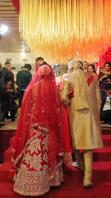 09th Feb 2026 : Vertical Shot of Bride and Groom Sharing a Joyful Moment at Their Indian Wedding