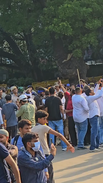 24th July 2026 : Vertical Shot of CJP Student Protest Over NEET Paper Leak at Jantar Mantar Delhi with protesters demanding the resignation of Union Education Minister Dharmendra Pradhan