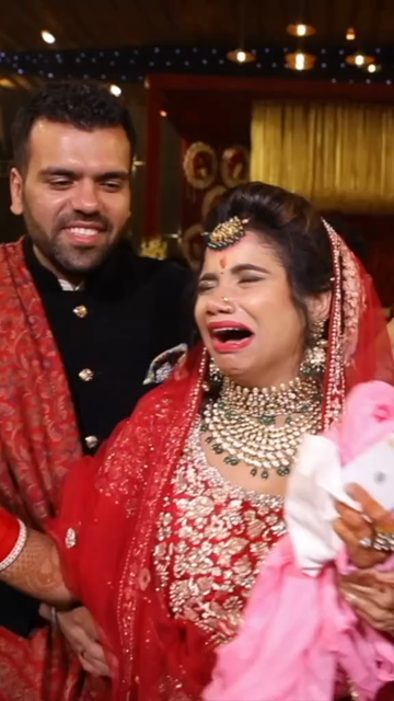 Vertical Shot of Emotional Bride and Father Sharing a Heartfelt Moment at Indian Wedding