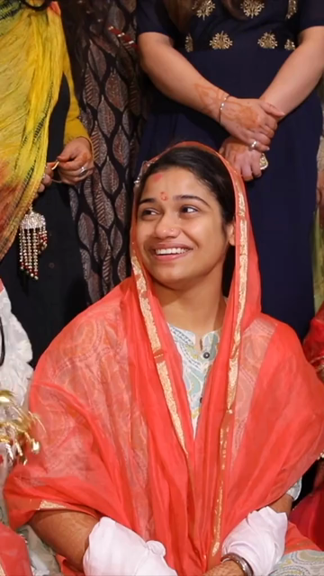 Vertical Shot of Emotional Bride-to-Be with Family During haldi Ceremony