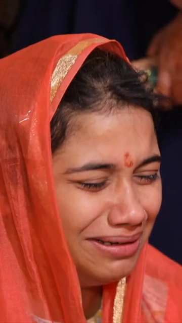 Vertical Shot of Emotional Bride-to-Be with Family During haldi Ceremony