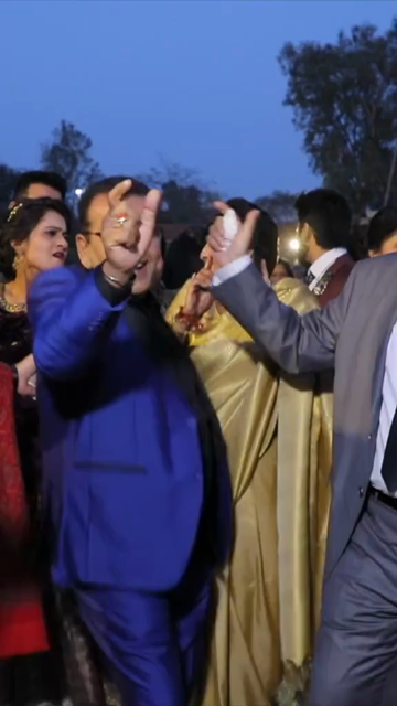 09th Feb 2026 : Vertical Shot of Family and Relatives Dancing During Indian Wedding Baraat