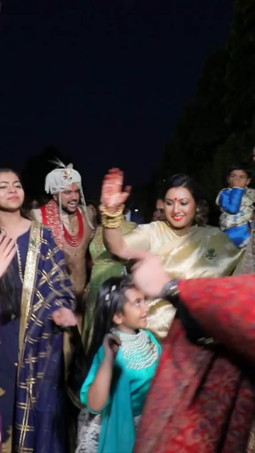 09th Feb 2026 : Vertical Shot of Family and Relatives Dancing During Indian Wedding Baraat