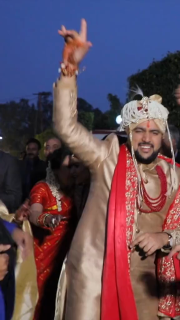 09th Feb 2026 : Vertical Shot of Groom Dancing with Family During Baraat Celebration