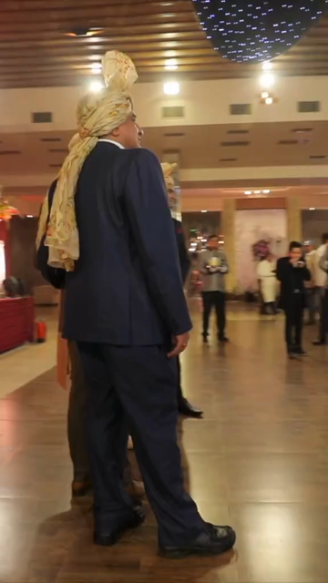 09th Feb 2026 : Vertical Shot of Groom Posing with Friends During Indian Wedding Baraat