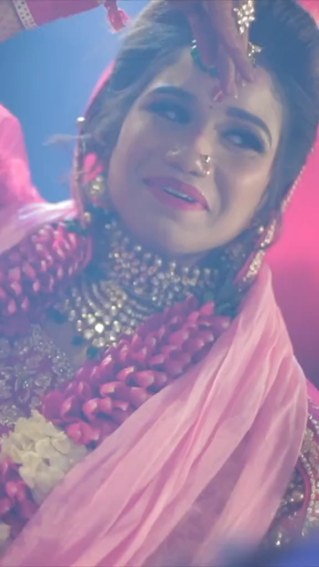 Vertical Shot of Indian Bride Dancing During Her Wedding Celebration