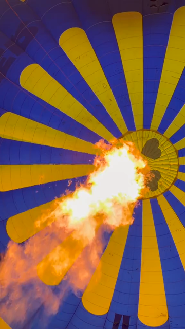 Vertical View Inside a Hot Air Balloon During Flame Burst