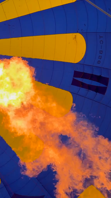 Vertical View Inside a Hot Air Balloon During Flame Burst