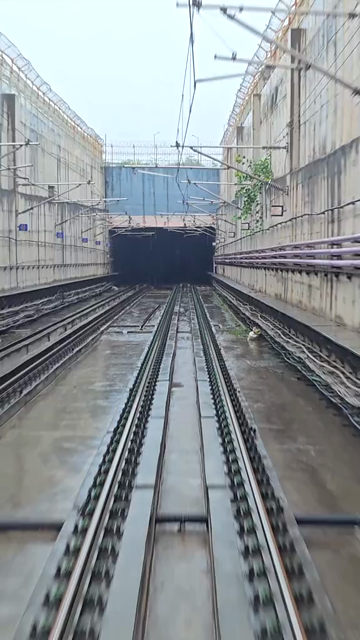 Vertical View of Delhi Metro Tracks in Rain, Delhi, India