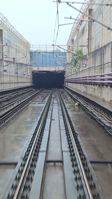 Vertical View of Delhi Metro Tracks in Rain, Delhi, India
