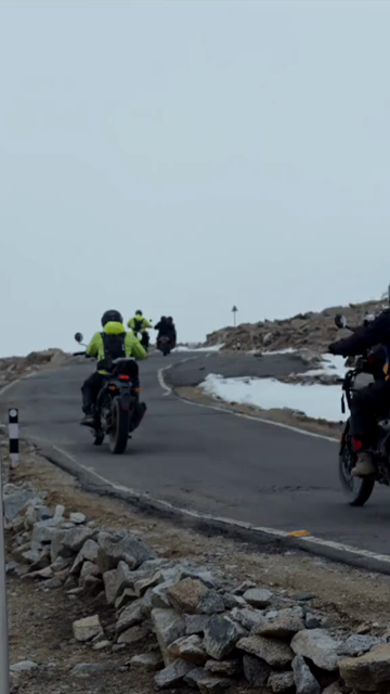 Vertical View of Motorcyclists Approaching Umling La Pass, Ladakh
