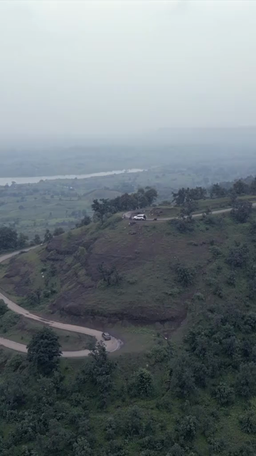 Vertical Aerial View of Lush Green Hills Forests and Water Bodies in Pratapgarh Rajasthan India