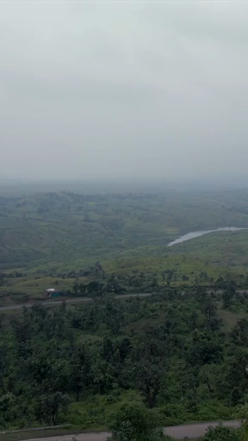 Vertical Aerial View of Lush Green Hills Forests and Water Bodies in Pratapgarh Rajasthan India