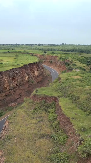 Vertical Aerial View of Lush Green Hills Forests and Water Bodies in Pratapgarh Rajasthan India
