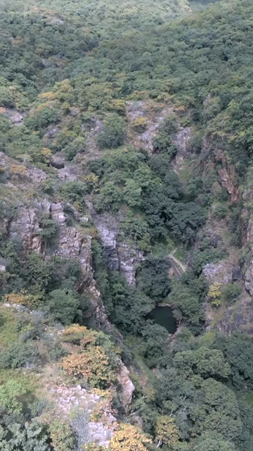 Vertical Aerial View of Lush Green Hills Forests and Water Bodies in Pratapgarh Rajasthan India
