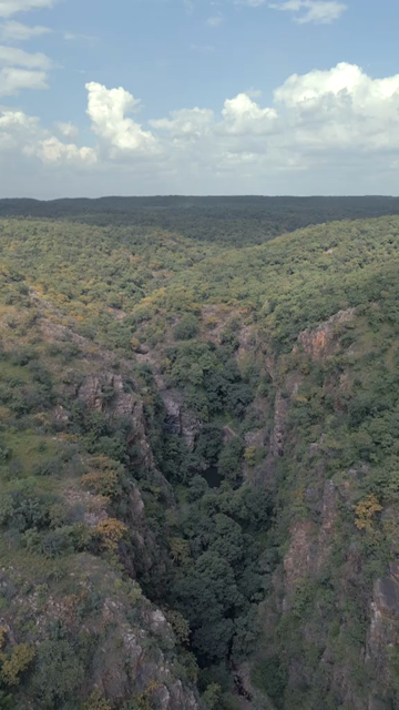 Vertical Aerial View of Lush Green Hills Forests and Water Bodies in Pratapgarh Rajasthan India