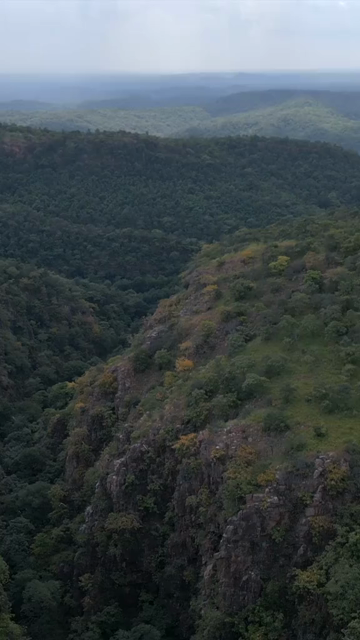 Vertical Aerial View of Lush Green Hills Forests and Water Bodies in Pratapgarh Rajasthan India